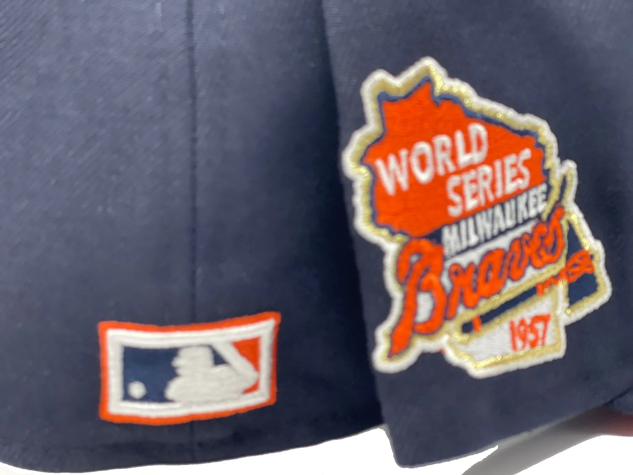 MILWAUKEE BREWERS 1957 WORLD SERIES NAVY ORANGE BRIM NEW ERA FITTED HAT