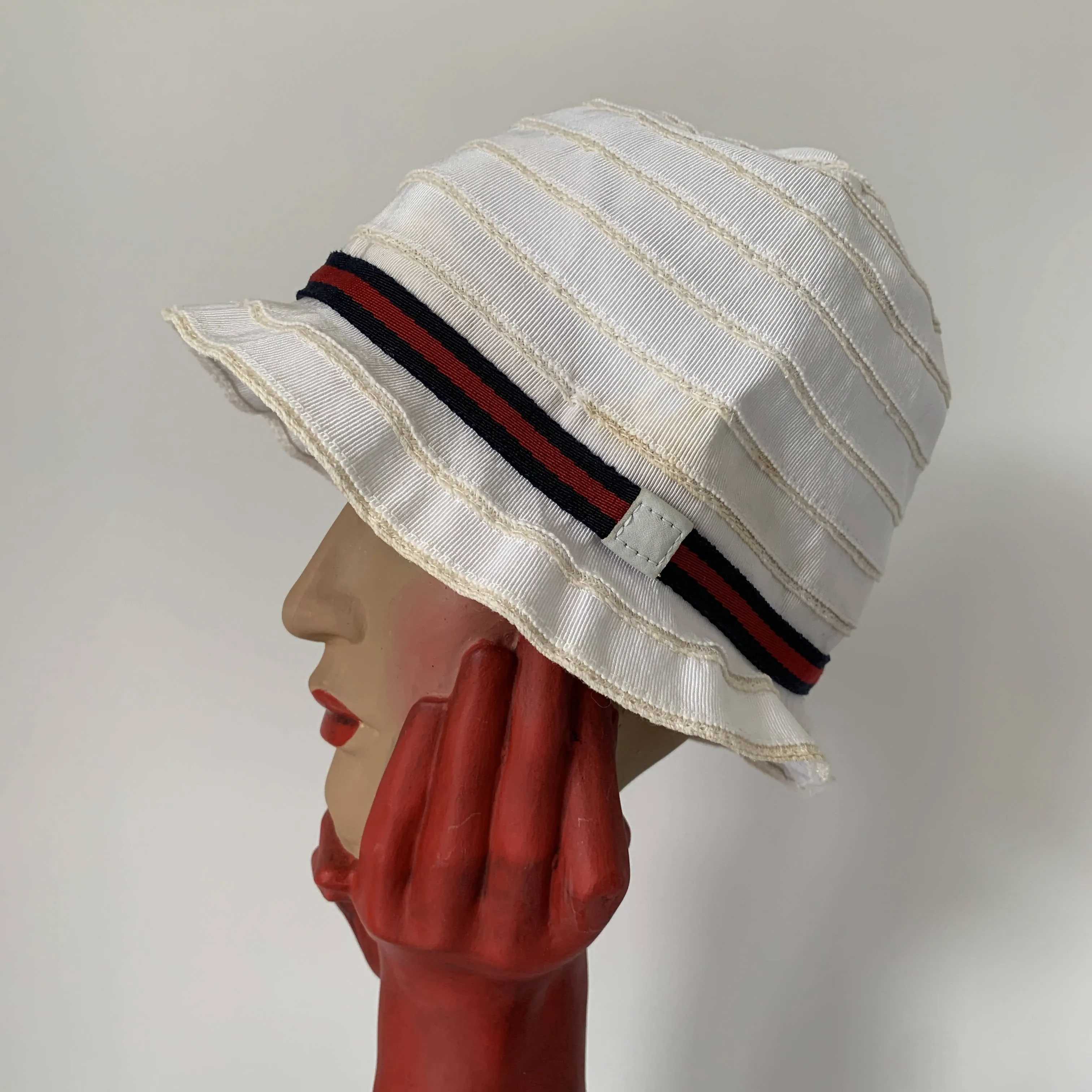 Vintage Gucci white cloche hat with signature stripe ribbon