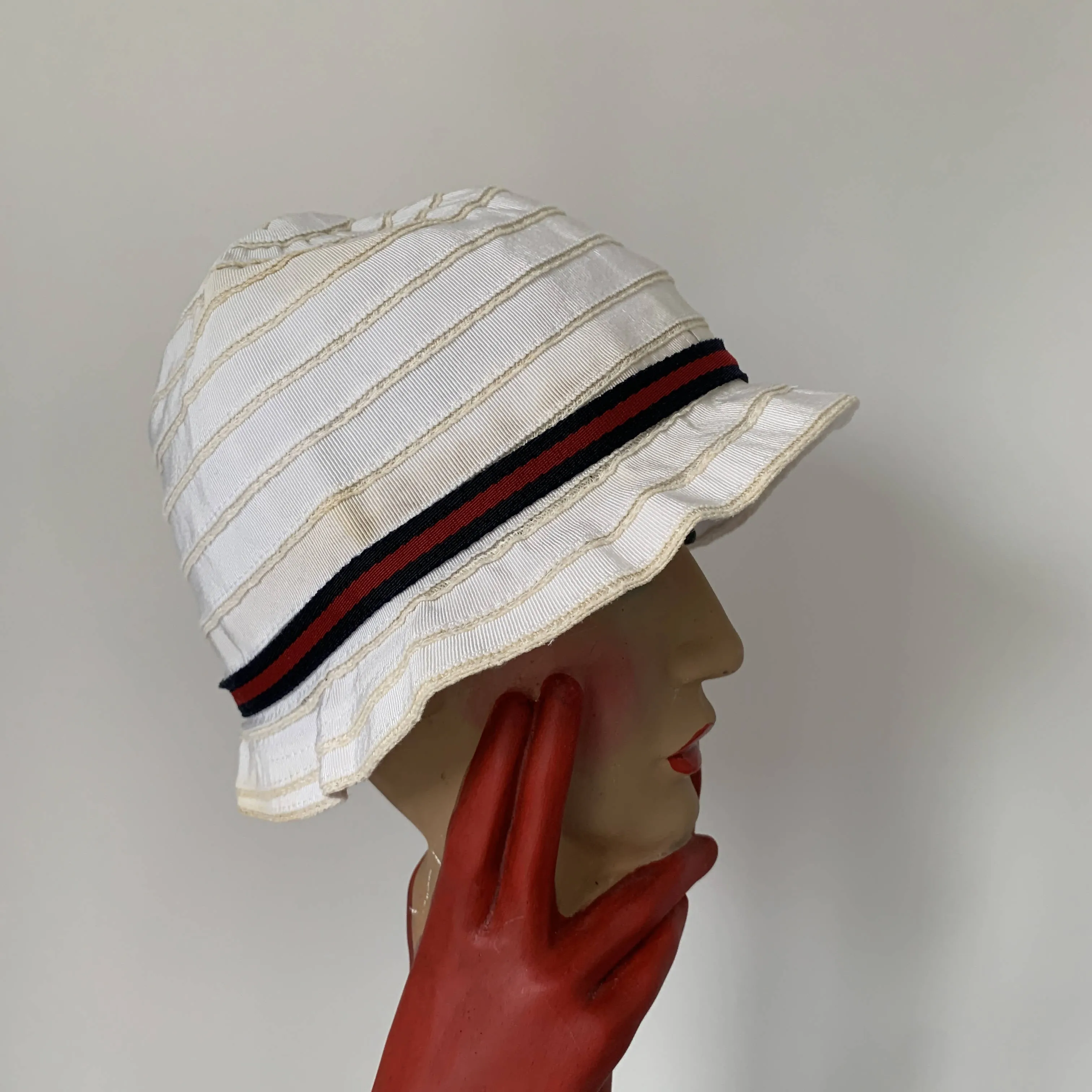 Vintage Gucci white cloche hat with signature stripe ribbon